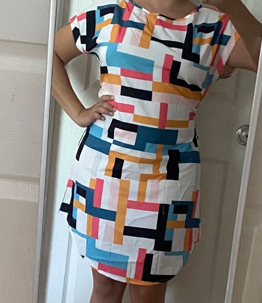 This  dress with a curved h